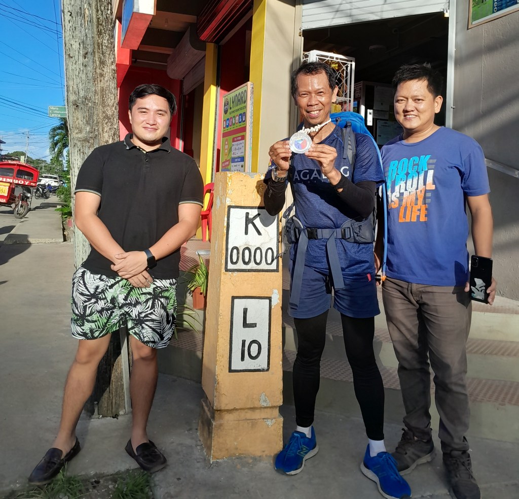 Back at KM0 after a full circumnavigation of the island of Siquijor on foot